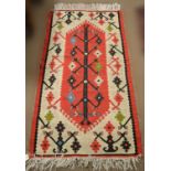 A Kelim rug.