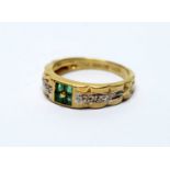 An emerald and diamond ring,