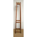 An early 20th C mahogany coat stand.