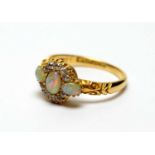 An opal and diamond ring,