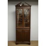 Early 20th C mahogany full-length corner display cabinet.
