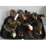 Collection of Beswick horses; and a wall plaque.