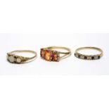 Three gemstone rings,