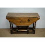 18th C and later oak drop leaf table.