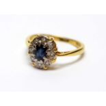 A sapphire and diamond cluster ring,