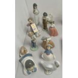 Collection of ten Nao figurines.