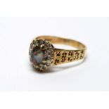 An opal and diamond cluster ring,