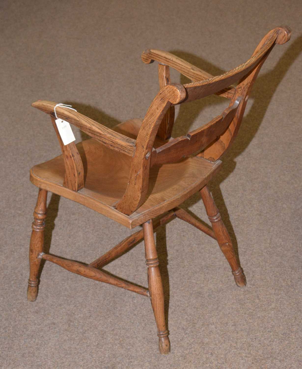 A rustic elm solid seat open armchair. - Image 2 of 2