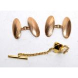 A pair of 9ct yellow gold cufflinks, and a lapel pin.