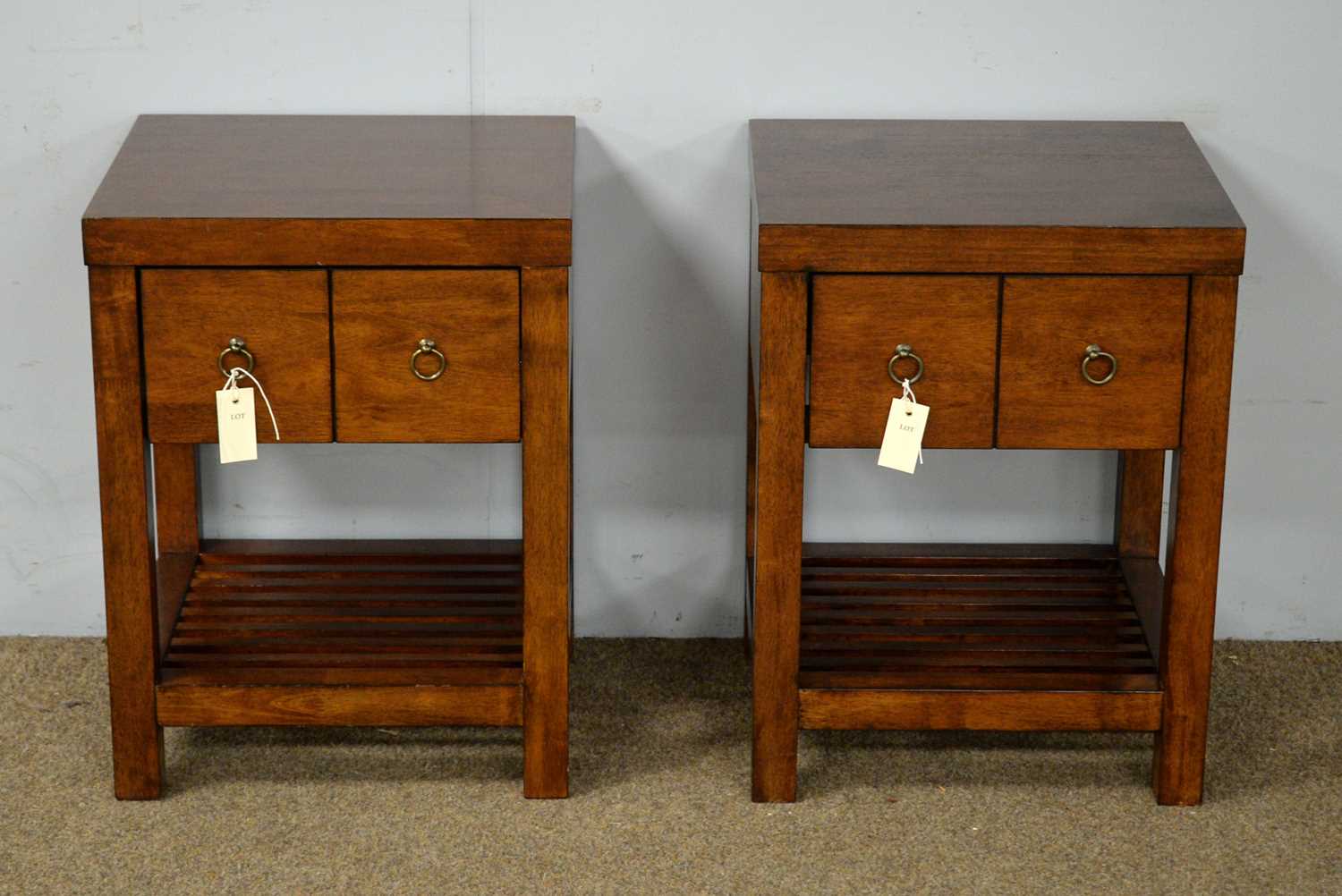 A pair of contemporary bedside chests