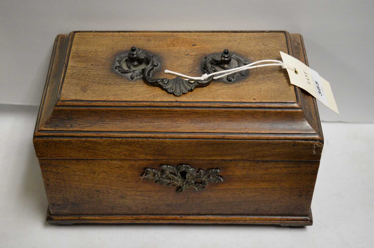 A Victorian mahogany tea caddy.