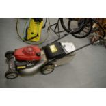 Honda IZY lawnmower and manual.