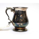 A silver tankard,