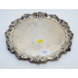 A silver salver, by Walker & Hall,