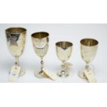 Four silver trophy cups,
