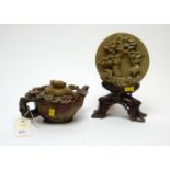 Chinese carved teapot and a Chinese circular plaque