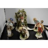 A selection of Capodimonte ceramic figures.