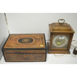 An Edwardian stationery box; and a Smiths electric mantel clock.
