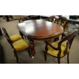 Victorian-style extending dining table; and a set of six chairs.