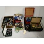 A selection of costume jewellery and watches.