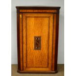 An Edwardian inlaid satinwood corner wall cupboard