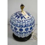 An Oriental blue and white pumpkin-form table lamp.