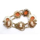 A 9ct yellow gold and carved shell cameo set bracelet,