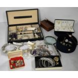 A selection of costume jewellery and watches.