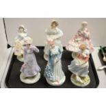 A collection of six Royal Worcester figures of ladies.