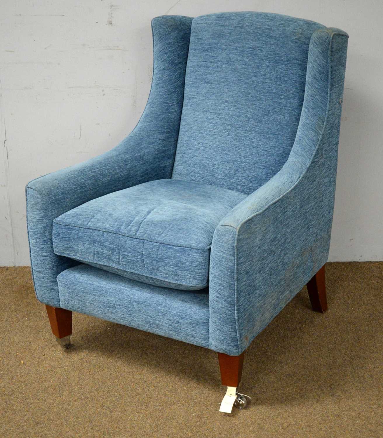 A Parker Knoll wingback armchair