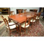 Oriental dining table, six single and two carver chairs.