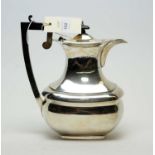 A silver hot water pot, by Jones & Crompton,