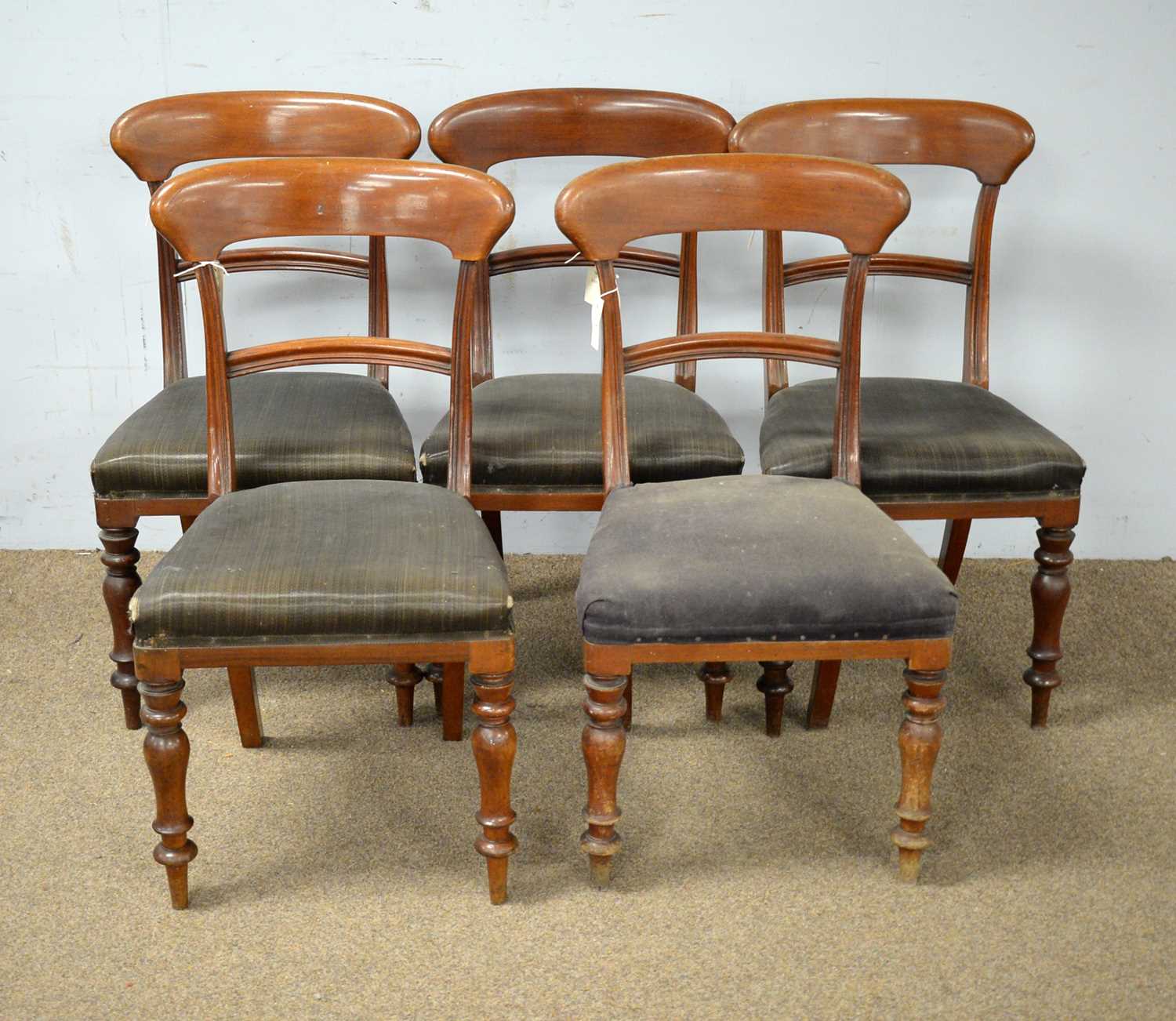 A set of five Victorian mahogany dining chairs