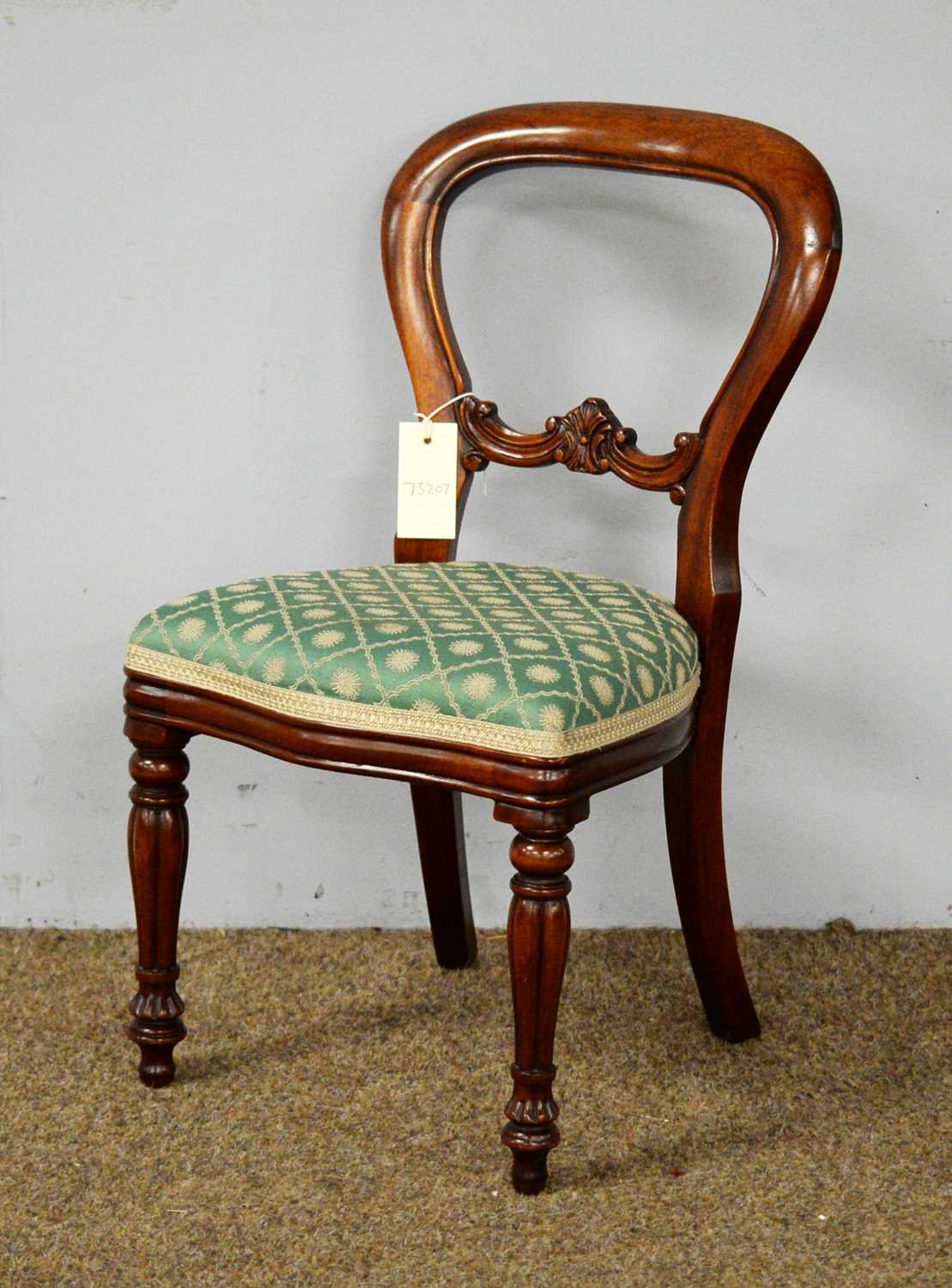 A 20th Century mahogany child’s balloon back chair