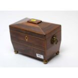 A Victorian banded rosewood sarcophagus tea caddy.