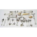 Silver teaspoons, forks and other items.