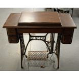 Singer treadle sewing machine.