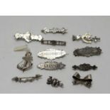 A collection of silver Victorian and early 20th Century brooches,