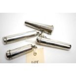 Four silver cigar holder cases,