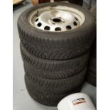 A set of four Nokian winter tyres.