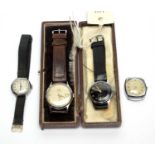 Four mid-20th Century watches,