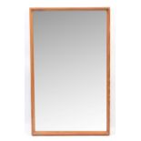 A mid Century teak wall mirror, probably Danish.