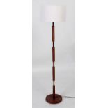 David Hunt Lighting: a Saddler luxury brown leather effect and brass floor lamp.