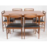 A. H. McIntosh & Co. Ltd, Kirkcaldy: a mid Century teak extending dining table and six chairs.