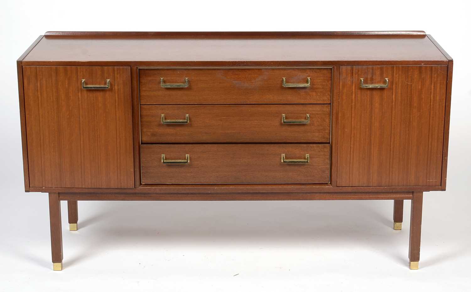 E. Gomme for G Plan: a tola wood sideboard.