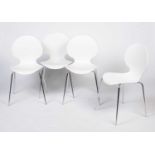 Galvano Tecnica: four Italian white plastic shell chairs.