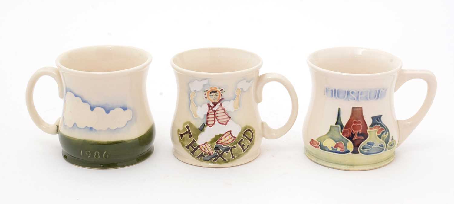 Three Moorcroft mugs by Sally Tuffin