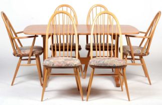 Ercol: an 'Aldeburgh' refectory table, and six 'Quaker' chairs.