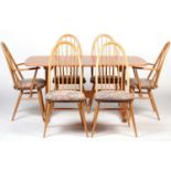 Ercol: an 'Aldeburgh' refectory table, and six 'Quaker' chairs.