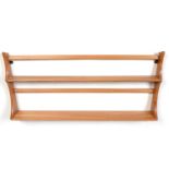 An Ercol: an elm plate rack No. 268.